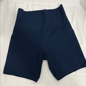 Athleta Deep Navy High-Rise Bike Shorts with Side Pockets